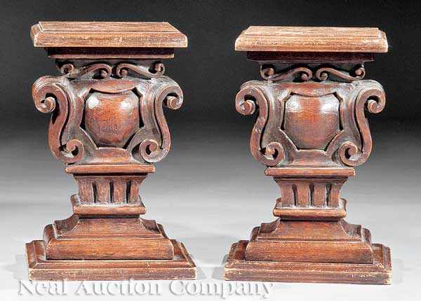 Appraisal: A Pair of Continental Carved Fruitwood Urn-Form Pedestals early th