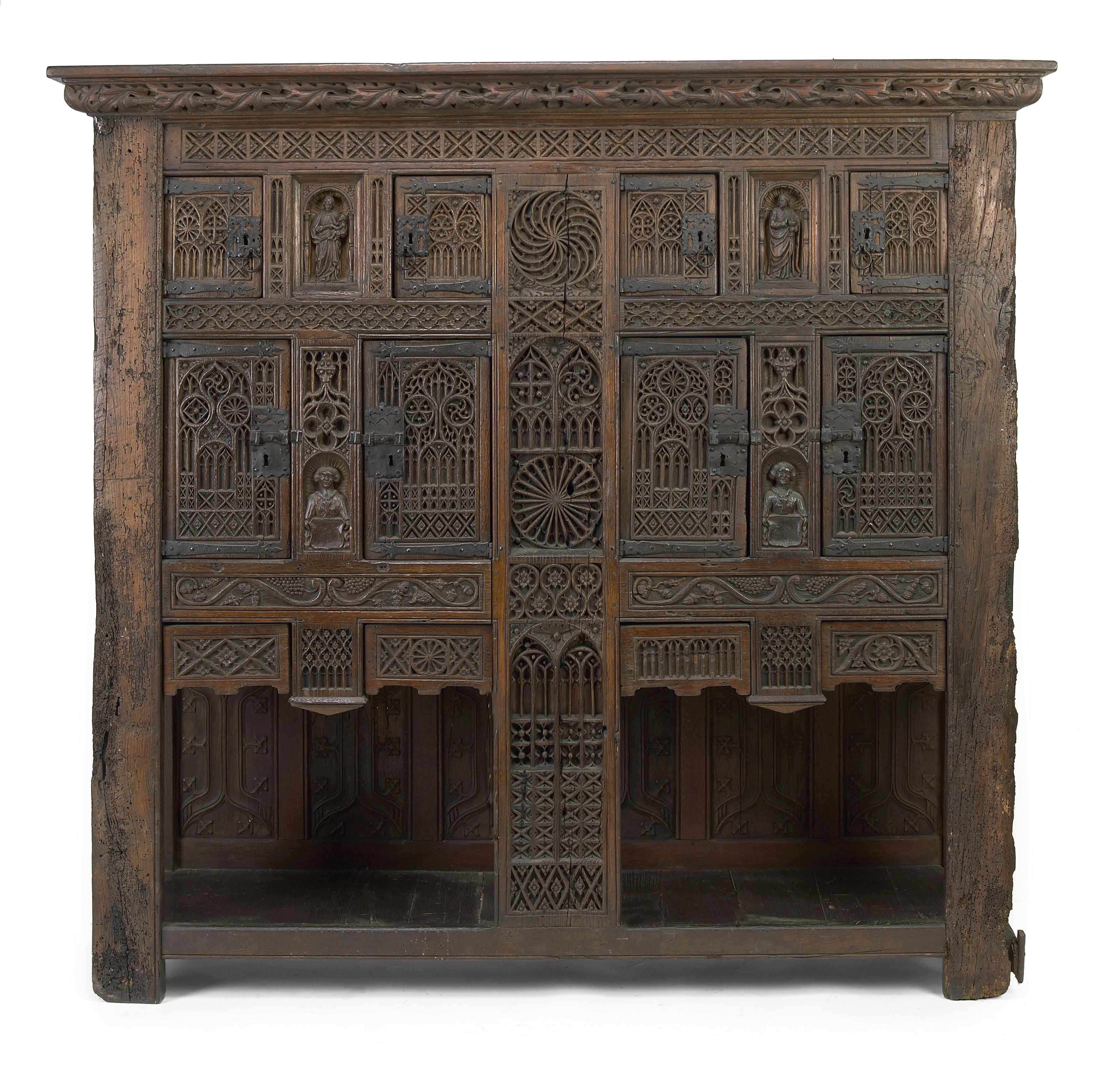 Appraisal: A Gothic Revival oak cupboard incorporating antique and later elements