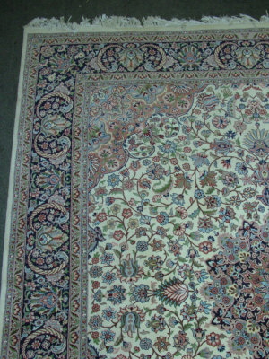 Appraisal: A modern Kirman carpet with pole medallion in an ivory