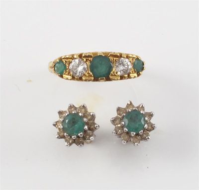 Appraisal: A five stone emerald and diamond set gold ring And