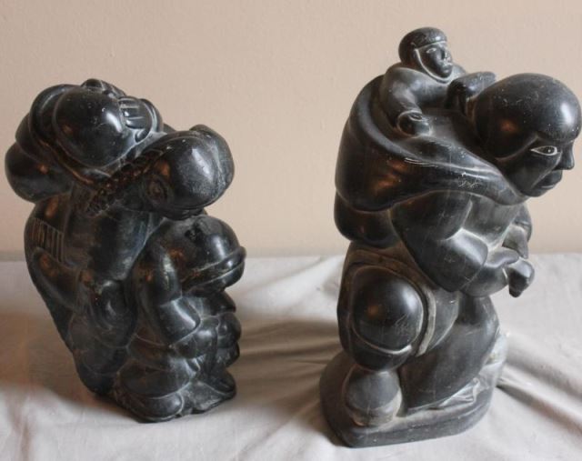 Appraisal: Piece Inuit Figural Grouping Lot Includes a figural grouping of