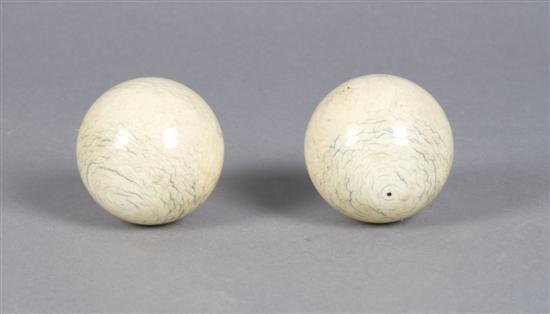 Appraisal: A Pair of Ivory Spheres Height inches