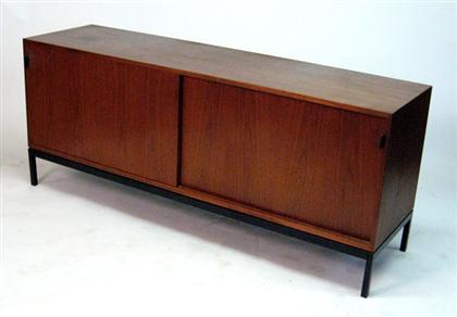 Appraisal: POSSIBLY FLORENCE KNOLL american b Two stained oak credenzas circa