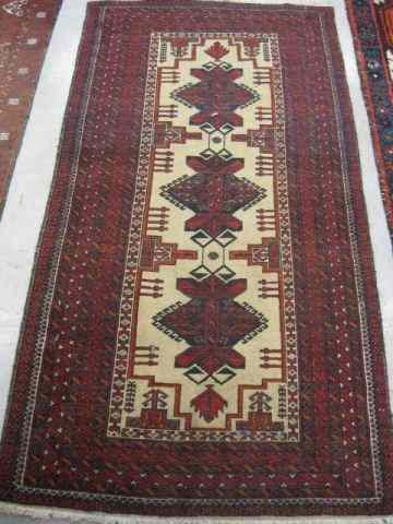 Appraisal: Baktierai Persian Handmade Rug medallions on ivory field indigo red