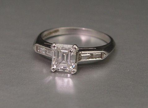 Appraisal: PLATINUM DIAMOND ENGAGEMENT RING Platinum ring center an emerald cut