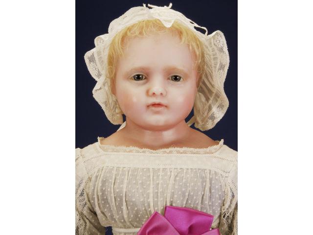 Appraisal: Portrait Face English Poured Wax Child England ca poured wax