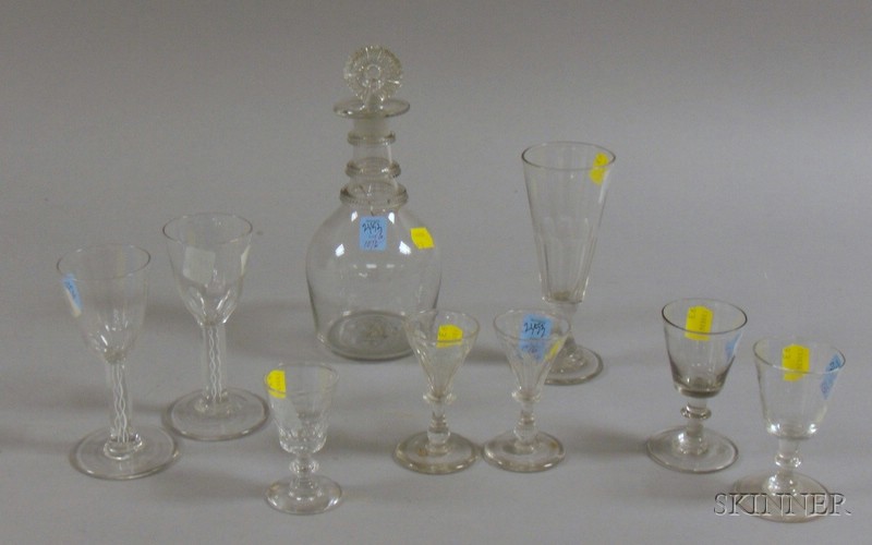 Appraisal: Eight Colorless Blown Glass Wine Stems and a Decanter including