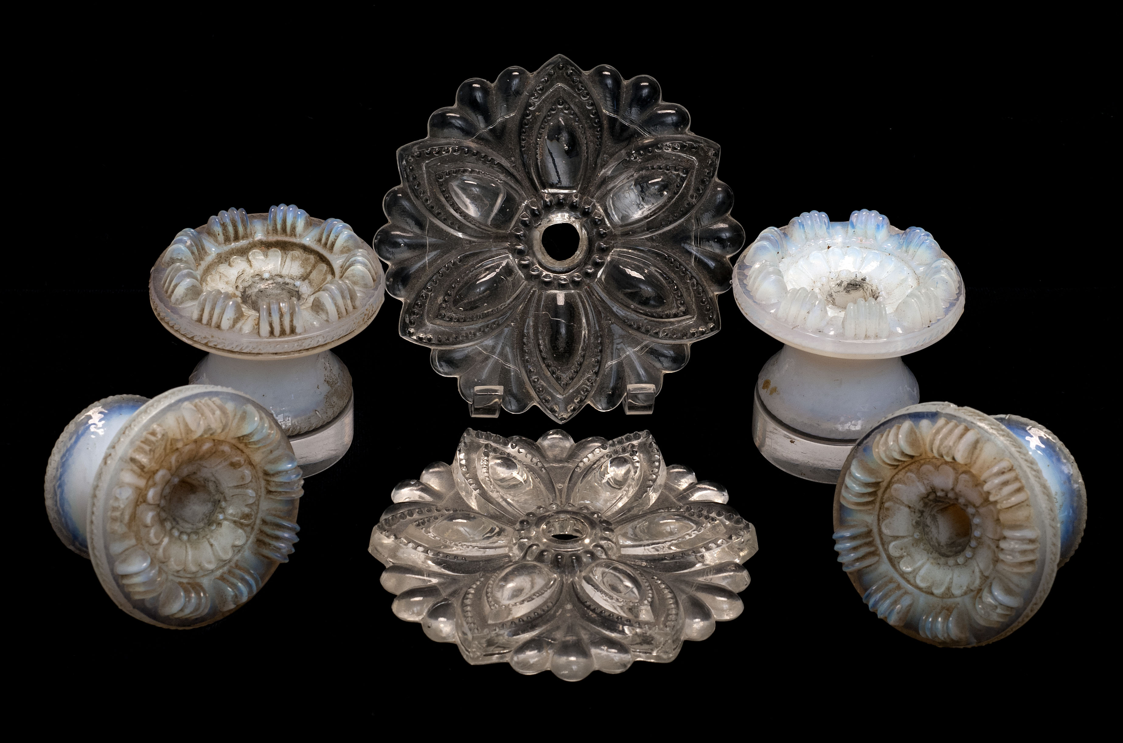 Appraisal: FOUR FIERY OPALESCENT LACY SANDWICH GLASS DRAWER PULLS Second Quarter