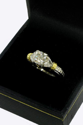 Appraisal: DIAMOND PLATINUM AND K GOLD RING WITH APPRAISAL centering a