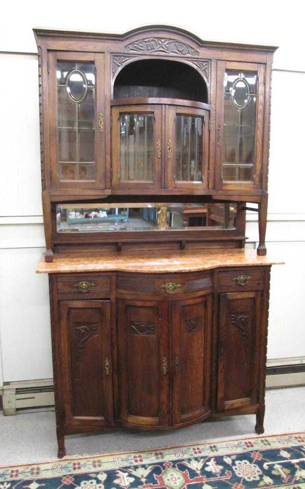 Appraisal: CARVED OAK SIDEBOARD WITH MARBLE TOP Belgian c in two