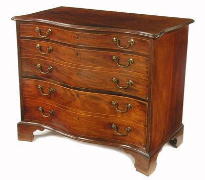 Appraisal: A George III mahogany serpentine front commode the moulded edge