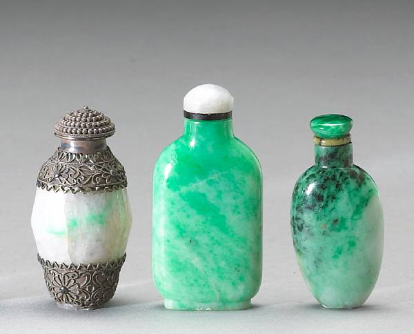 Appraisal: Three jade snuff bottles Comprising one mottled green and white