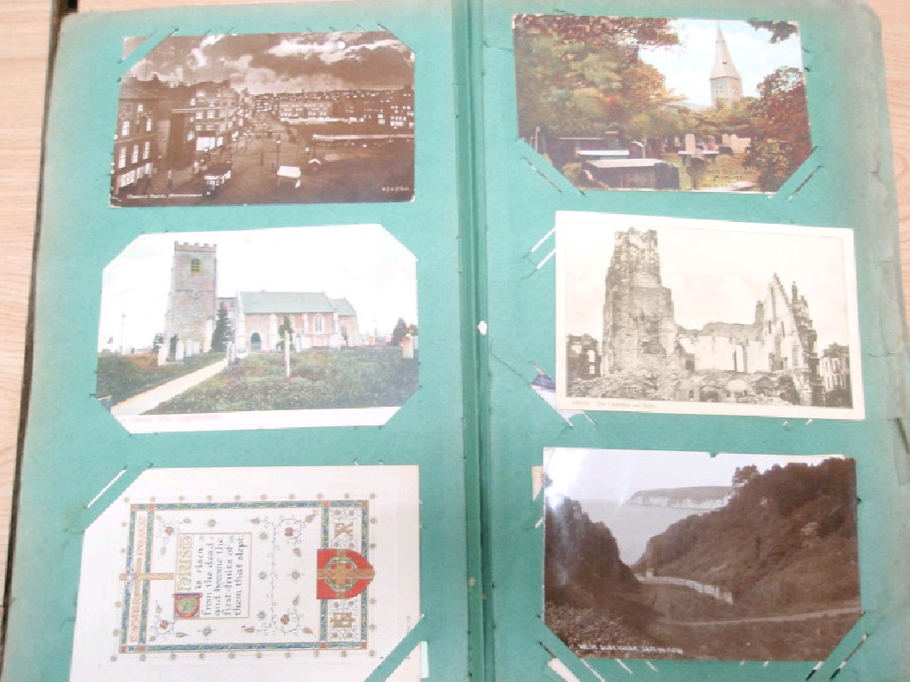 Appraisal: Topographical postcards in a single album and loose examples