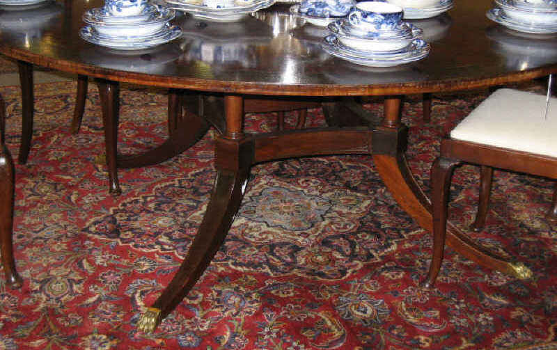 Appraisal: ENGLISH BURL-ELM CIRCULAR DINING TABLE Large top with mahogany crossbanding