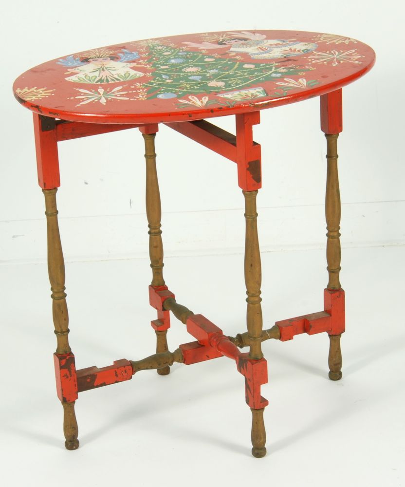 Appraisal: PETER HUNT-STYLE OVAL FOLDING TABLE Painted red with Christmas design