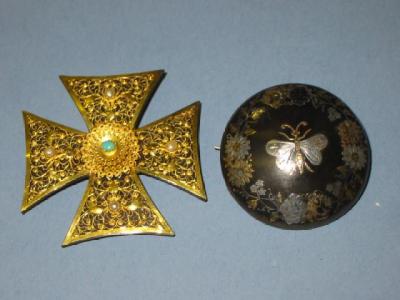 Appraisal: A TORTOISESHELL BROOCH modelled as a Maltese Cross overlaid with