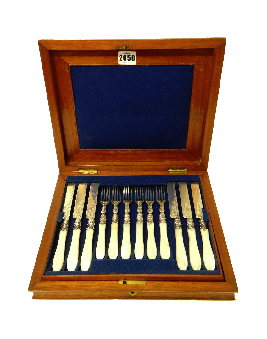 Appraisal: Twelve Victorian pairs of silver dessert knives and forks with