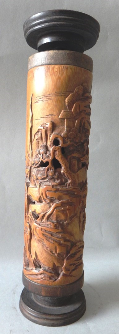 Appraisal: A Chinese cylindrical wooden incense burner th th century carved