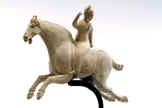 Appraisal: TANG POTTERY POLO PLAYER Chinese Tang Dynasty grey pottery polo