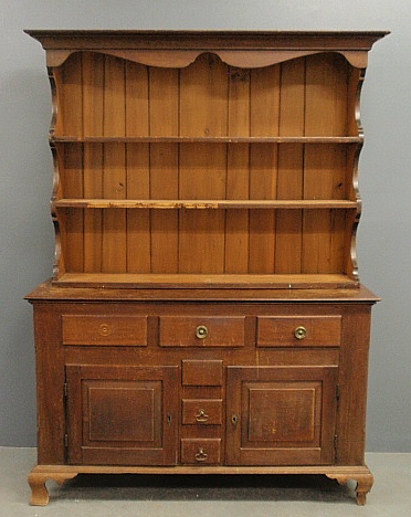 Appraisal: - Pennsylvania pine two-part open Dutch cupboard early th c