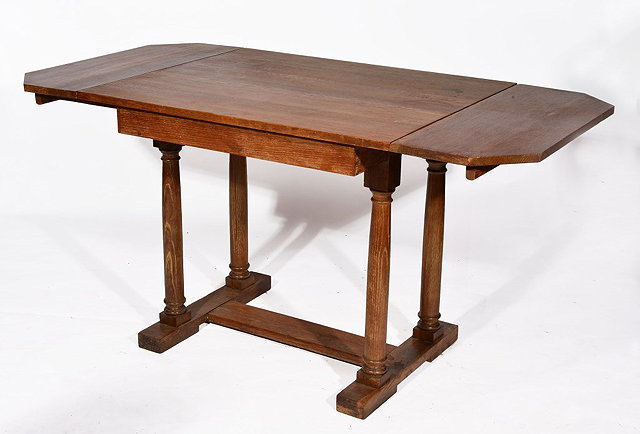 Appraisal: A HEALS STYLE OAK DROP LEAF TABLE with octagonal shaped