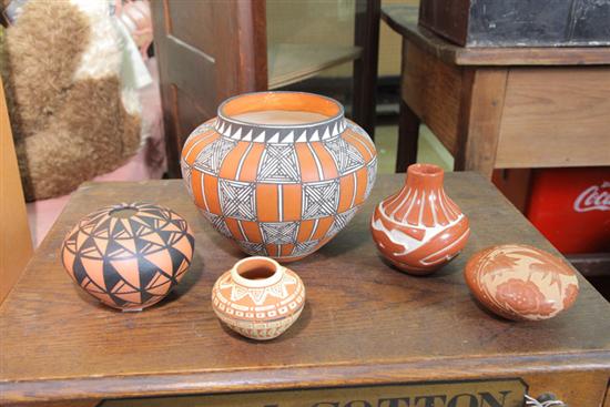 Appraisal: FIVE CONTEMPORARY AMERICAN INDIAN POTTERY JARS Three are incised two