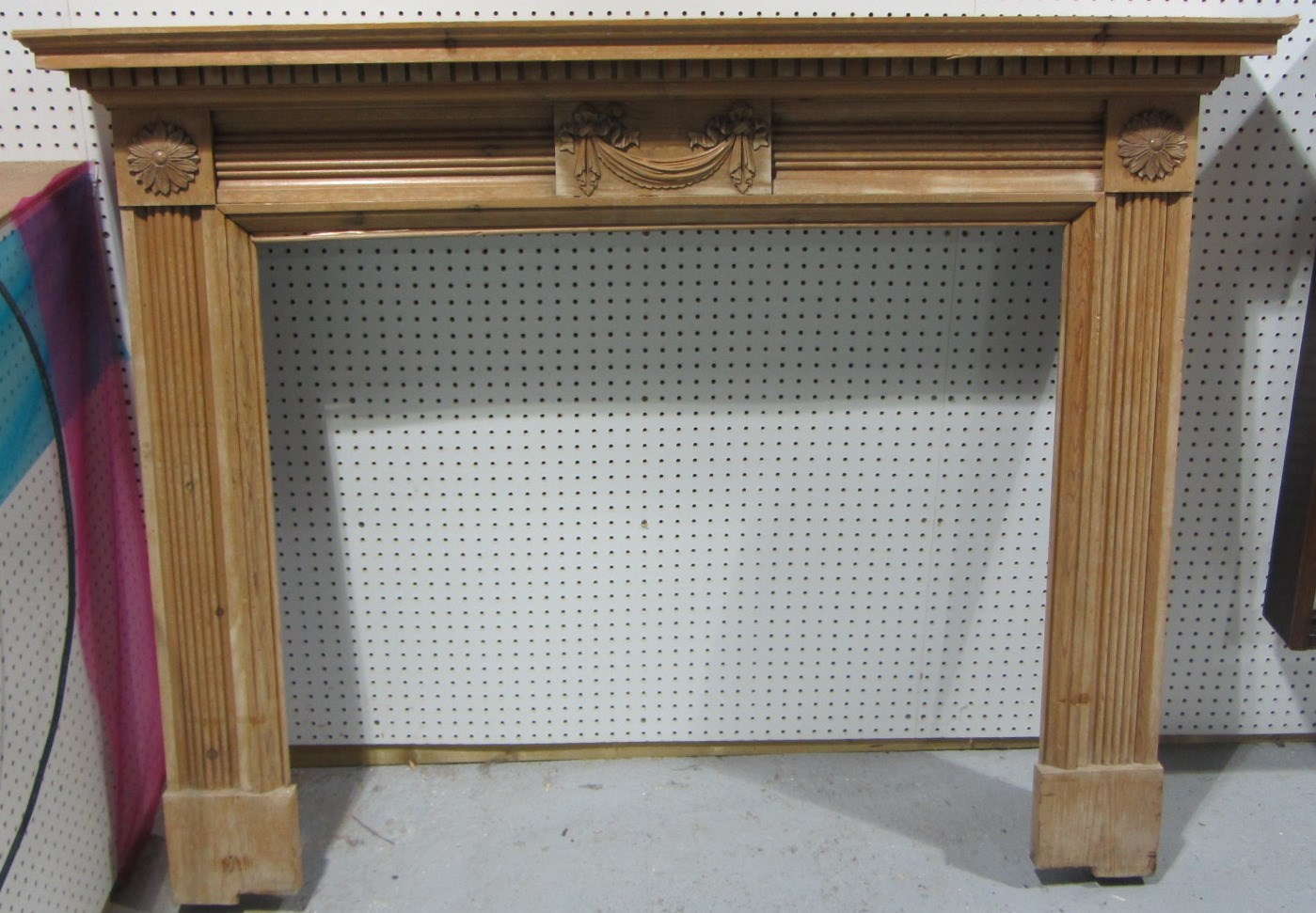 Appraisal: An 'Adams' style pine fireplace surround