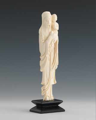 Appraisal: A Carved Ivory Figure of a Man Pegged to a