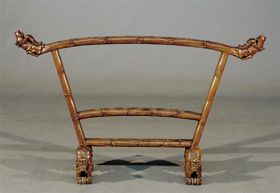 Appraisal: Chinese carved hardwood cane stand stylized frame on dragon trestles