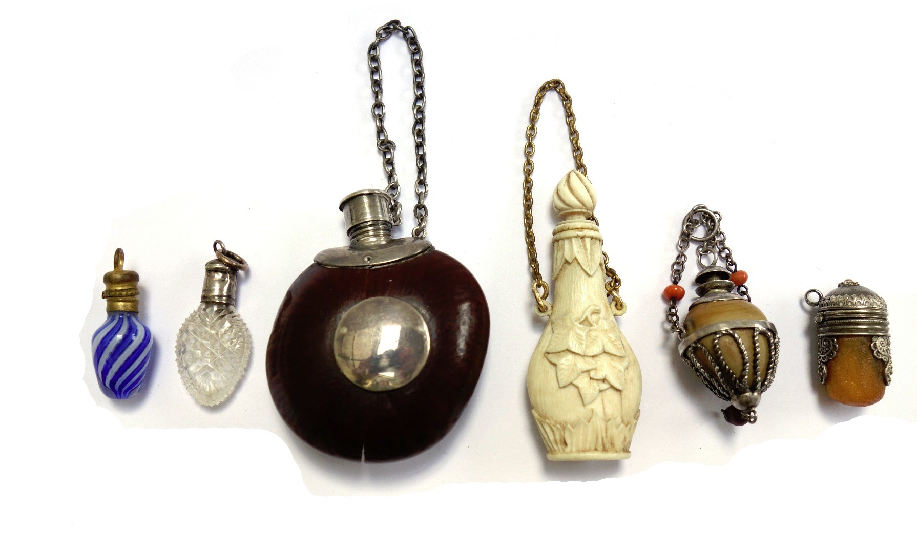 Appraisal: A novelty scent bottle made from a conker or similar