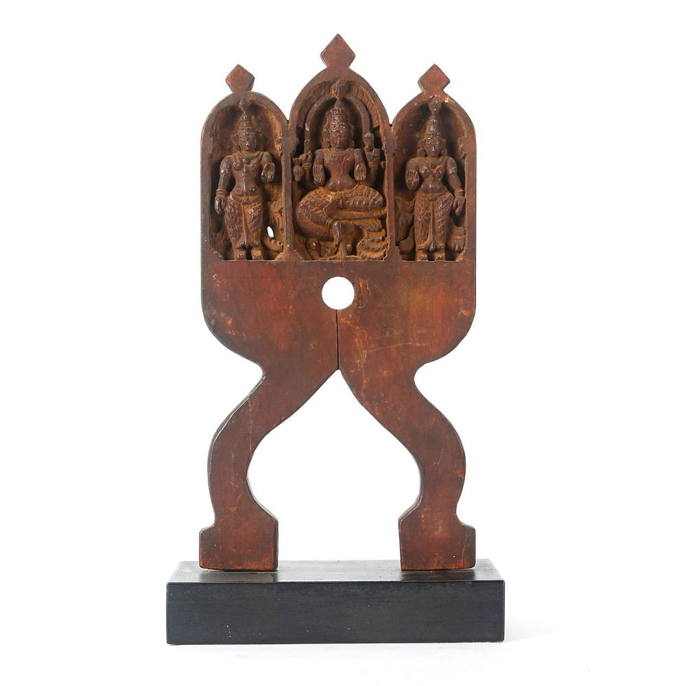 Appraisal: TH C INDIAN WOODEN SCULPTURE ON BASE Carved wooden sculpture