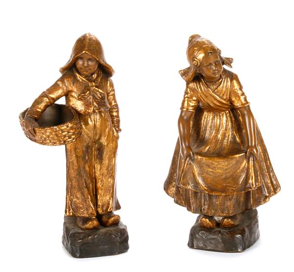 Appraisal: A pair of Goldscheider terracotta figures of Dutch children height