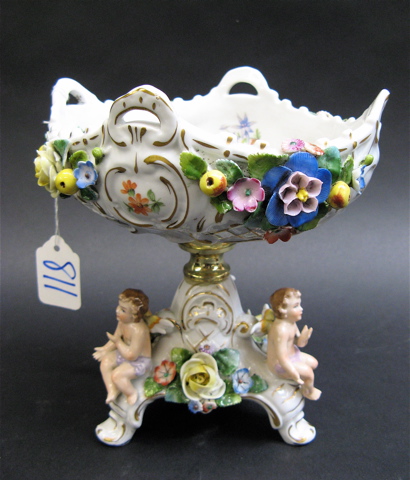 Appraisal: GERMAN SITZENDORF PORCELAIN COMPOTE having three cherubs applied floral and