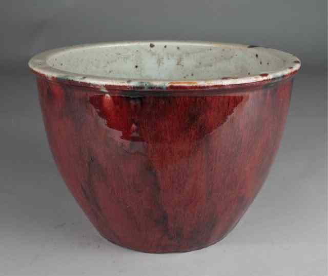 Appraisal: Chinese Strawberry Glaze Porcelain PlanterHeavily potted with a rich strawberry