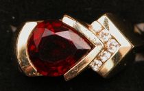 Appraisal: Diamond and Garnet Ring K yellow gold ring features one