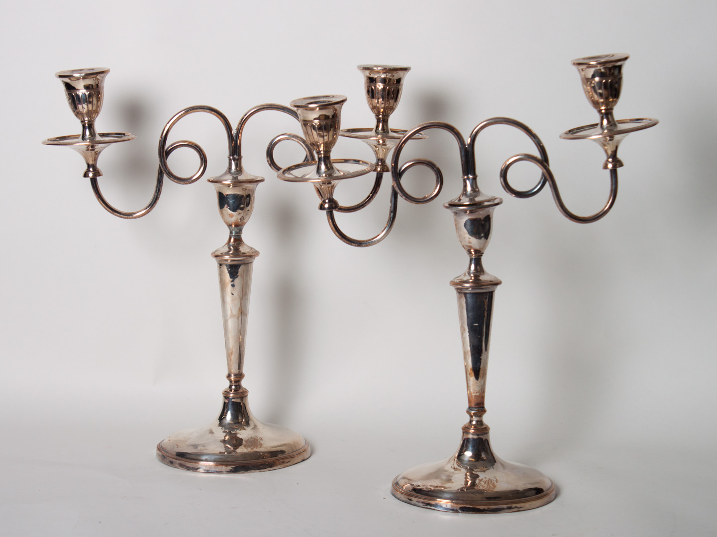 Appraisal: Pair of Georgian silver-plated candelabra first half - th century