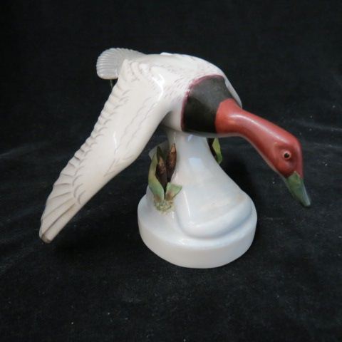 Appraisal: Boehm Porcelain Figurine of a Goose in Flight cattails on