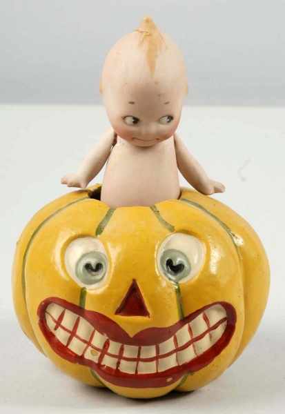 Appraisal: O'Neill Kewpie within Papier Mache Jack-O-Lantern Description Party favor at