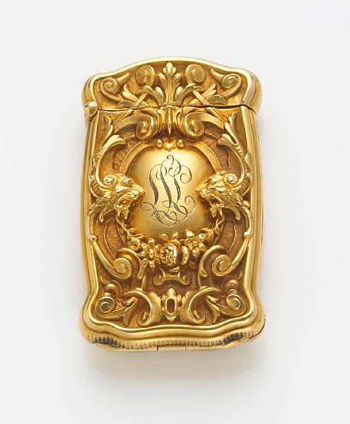 Appraisal: An art nouveau k gold match safe with hinged drop