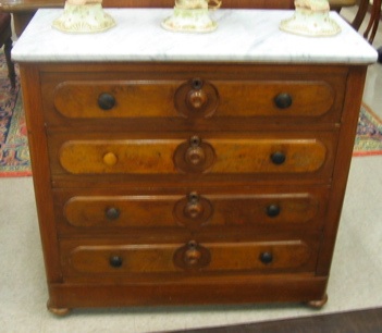 Appraisal: VICTORIAN WALNUT CHEST OF DRAWERS American last quarter of the