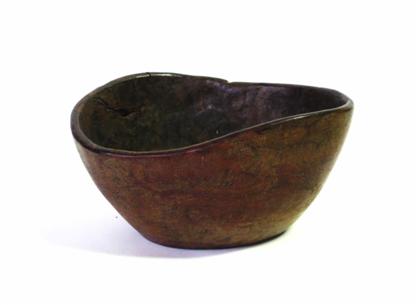 Appraisal: Carved burl bowlOf naturalistic oval form