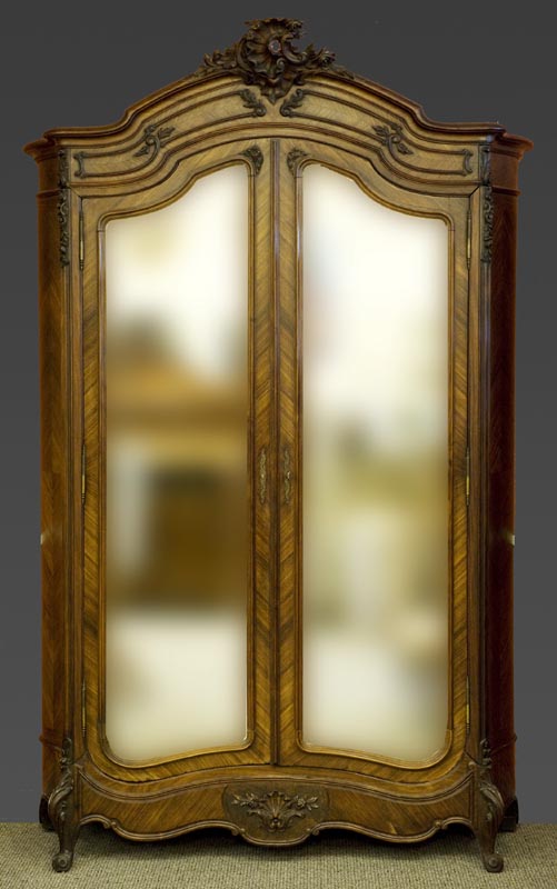 Appraisal: Louis XIV style mahogany and mahogany veneer two door armoire