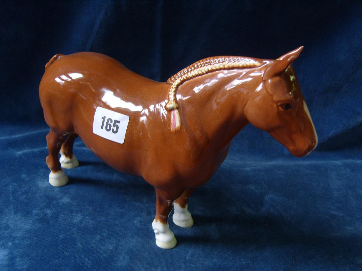 Appraisal: A Beswick model of a chestnut coloured Suffolk punch horse