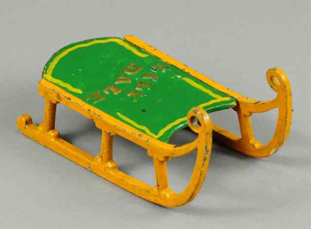 Appraisal: 'LILY DALE'' MINIATURE TOY SLED Stevens Mfg cast iron colorfully