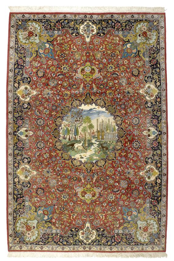 Appraisal: ISFAHAN old Red central field with trailing flowers and palmettes