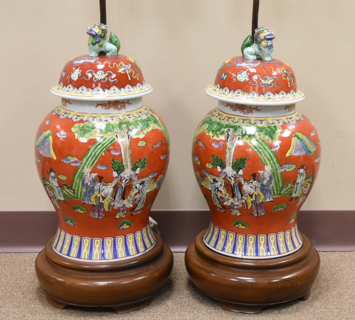 Appraisal: LARGE PAIR OF CHINESE RED FIGURE LAMPS TH C A