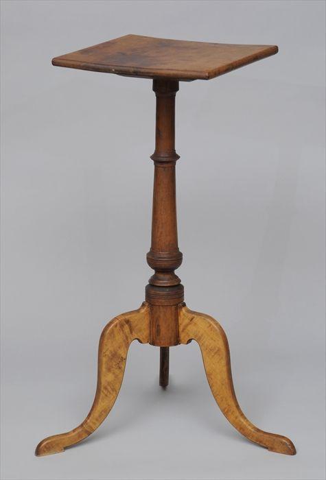 Appraisal: CHIPPENDALE MAPLE CANDLESTAND The square top over baluster-turned standard on