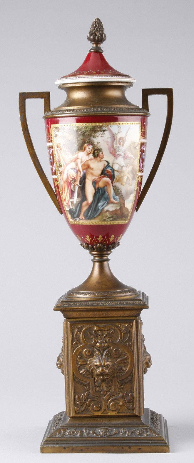 Appraisal: Urn features classical scene with nude figures and chariot maroon