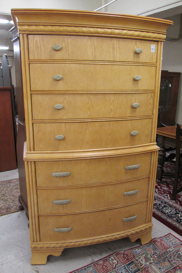 Appraisal: RETRO BOW-FRONT CHEST-ON-CHEST featuring seven large drawers Dimensions H x