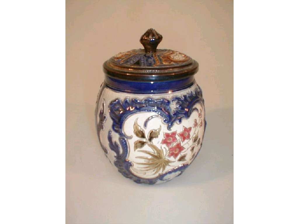 Appraisal: A continental pottery biscuit barrel or tobacco jar painted and